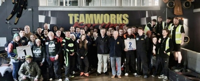 Group of individuals taking part in a Go Karting Challenge to raise money for cancer charity The Lewis Foundation