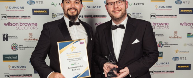 Accommodation Concern’s David McClatchey and John Perry receiving the North Northamptonshire Business of the Year Award at the Northamptonshire Business Awards Ceremony