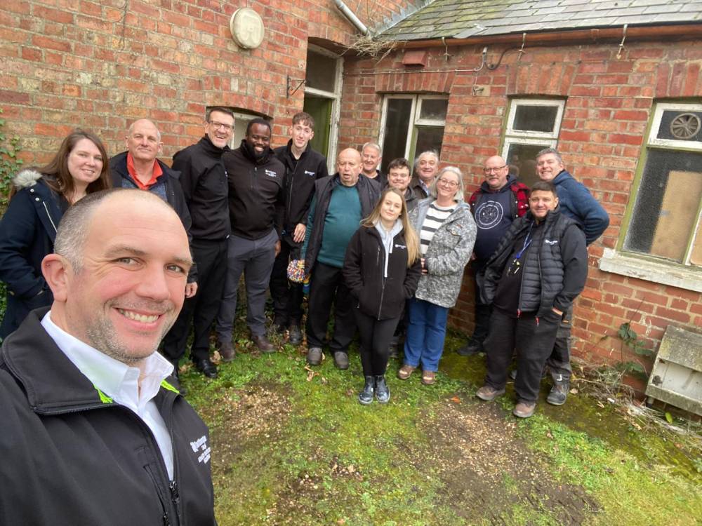 Representatives from Northampton College and Delapre Abbey outside Gardener’s Cottage Number 2