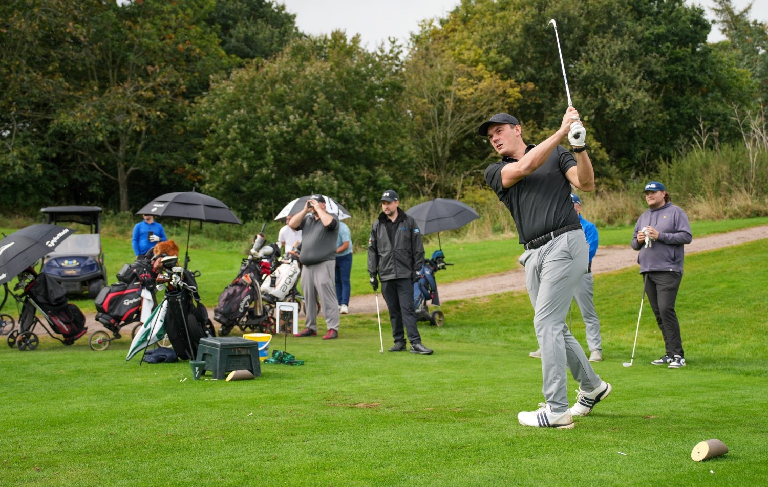 A golfer tees off at a previous Cynthia Spencer Hospice golf event
