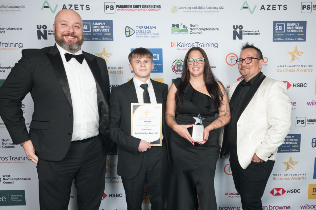 20160805-L1680395 Award winners celebrating with their trophy at the 2026 Northamptonshire Business Awards